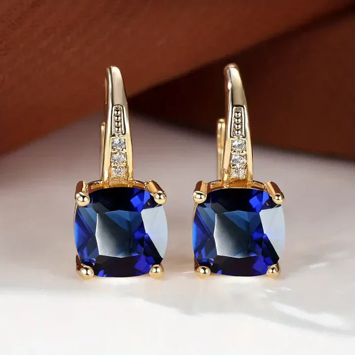 Zlaté kruhové náušnice s tajomnými kameňmi